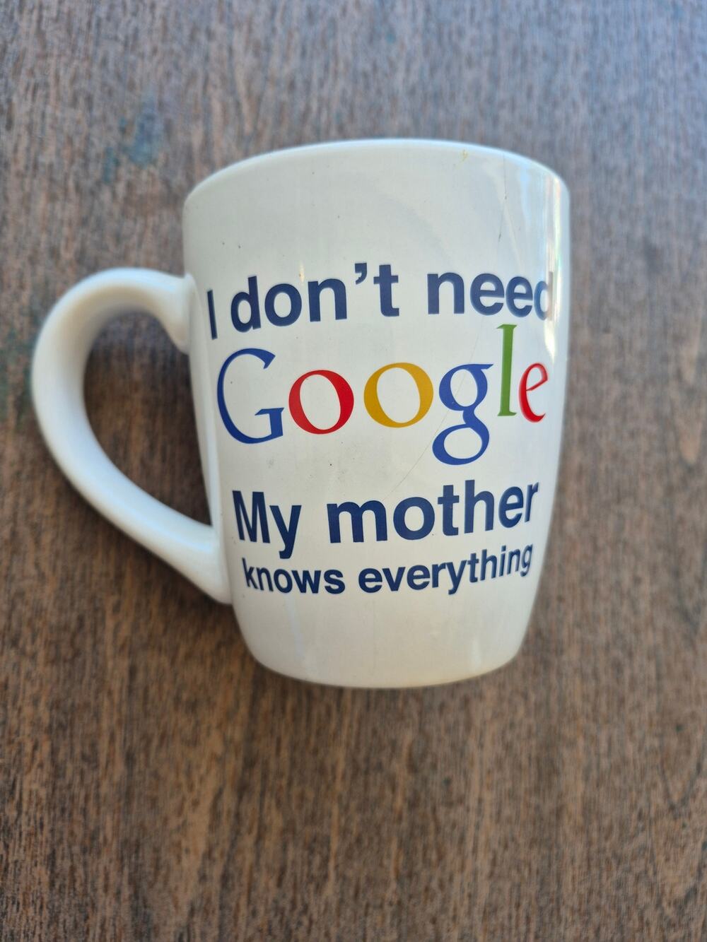 "Mom knows everything " Coffee Cup.